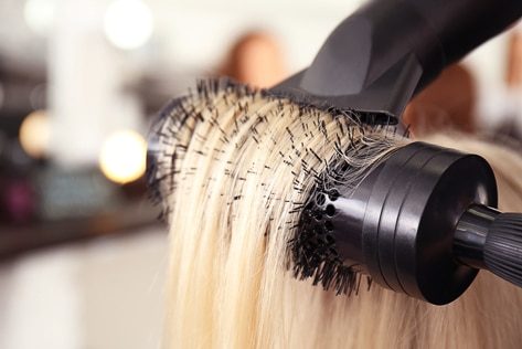 Drying Blonde Hair — Hair Salon in Darwin, NT